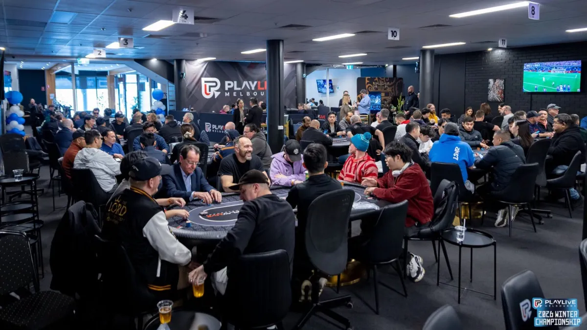 The PlayLive Melbourne floor with every table seated, under the branded backdrop, during the 2026 Winter Championship.